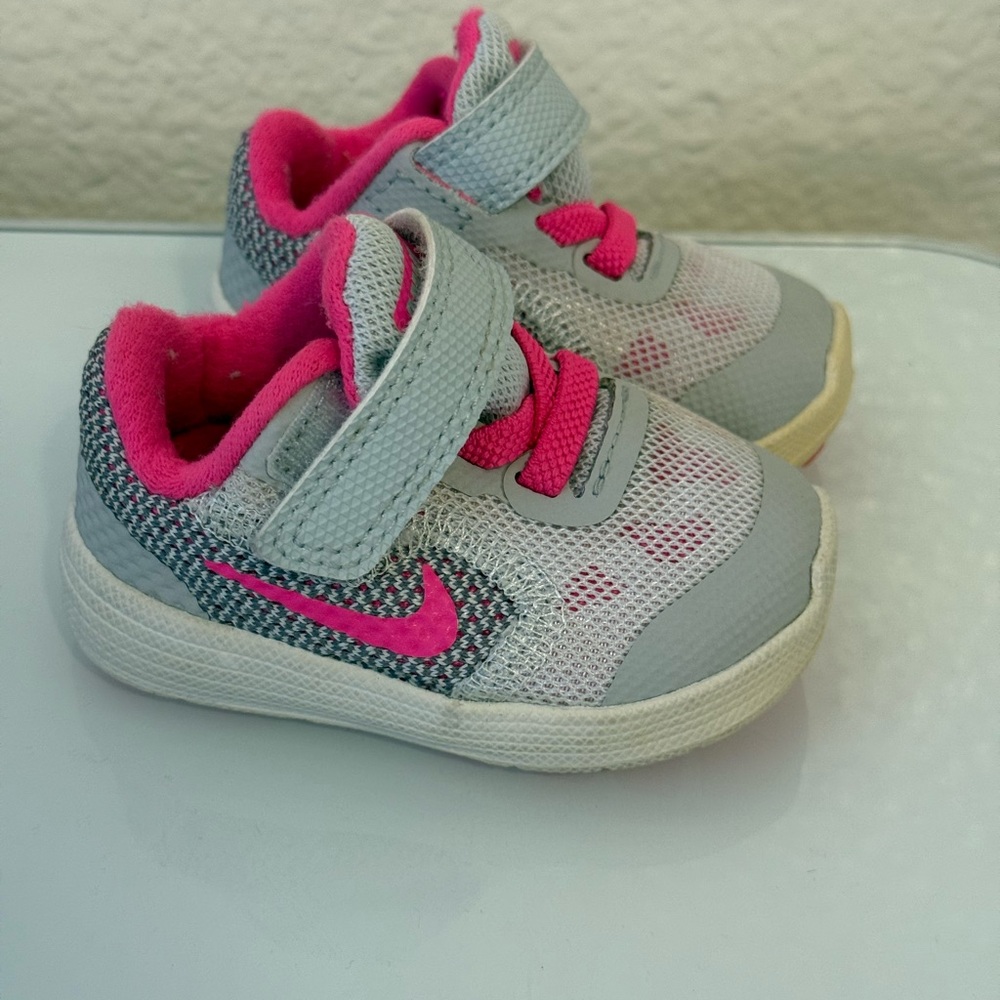 Nike Revolution Baby Sneakers in Gray and Pink